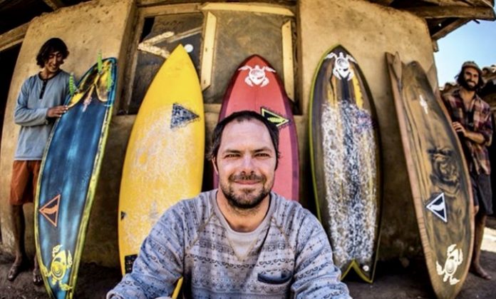 Ryan with surfboards